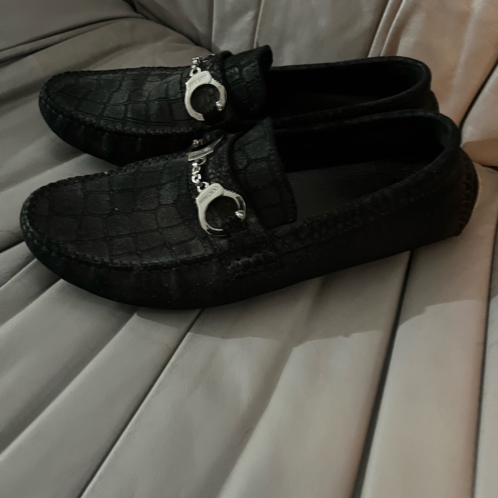 Jimmy Choo’s Black Loafers with Silver handcuff Accent eu42